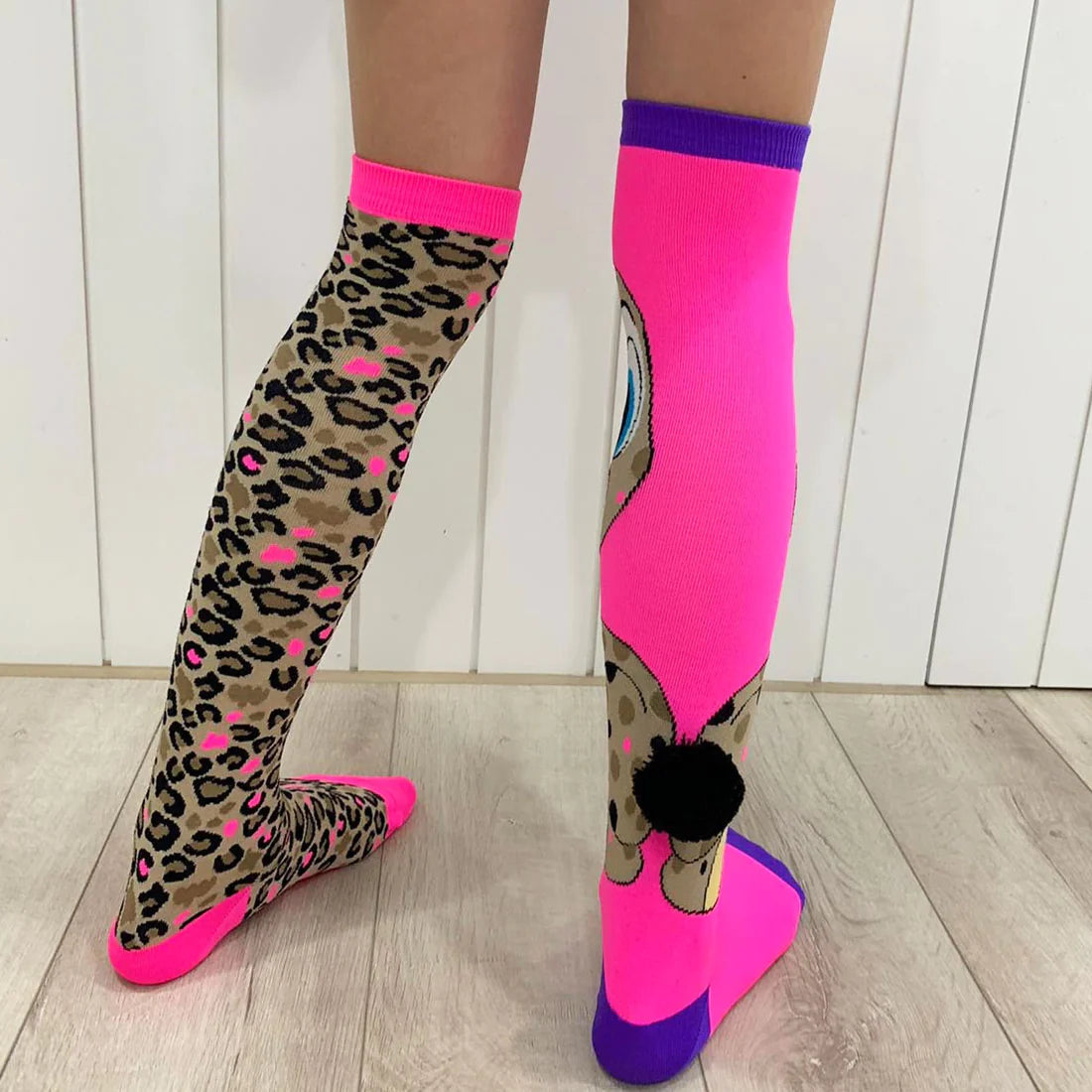 With our Cheeky Cheetah Socks in leopard print, embrace your wild side. They'll instantly make any outfit stand out thanks to their textured leopard style and real Cheetah with velvet ears and a pom pom tail. Roar!