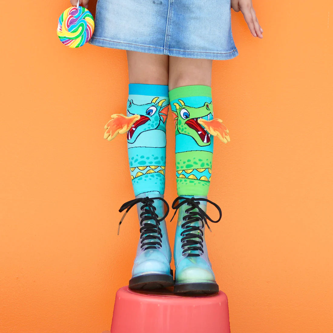 Get ready for an adventure with these epic dragon socks! These fun silly unisex socks feature bold and colorful dragon designs that are sure to spark your sense of wonder. Whether they're pretending to fly through the skies or just lounging around the house, these socks will keep their feet feeling fierce and fabulous. So let your dragon spirit soar with these magical fun kids and adult socks!