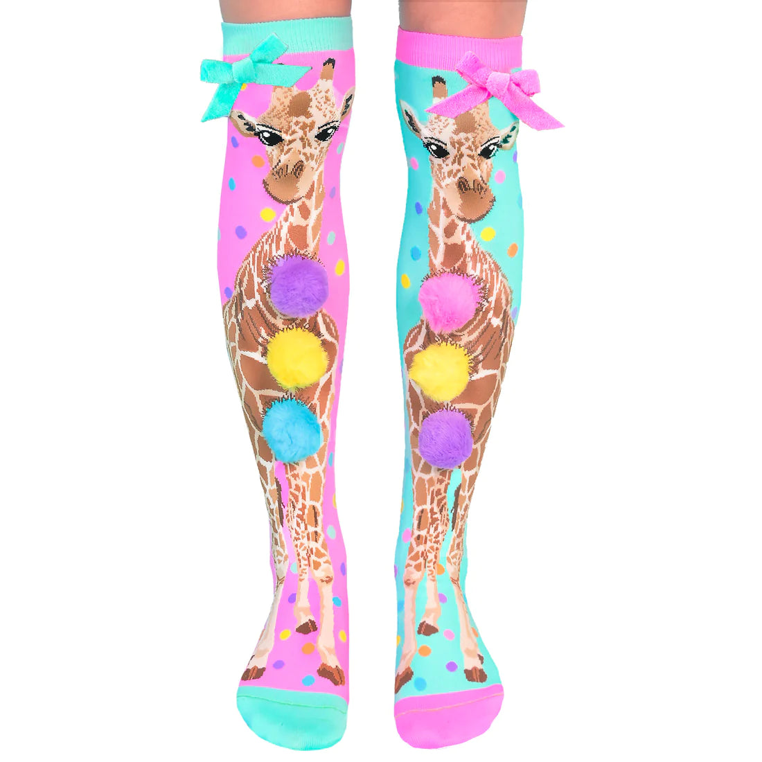 The prettiest pair of Giraffe socks you will ever see are our brand-new MADMIA Giraffe socks, which are now available. Everywhere you go, they make a big impact thanks to custom-made Pom Poms and a pink and blue bow attached to the side.