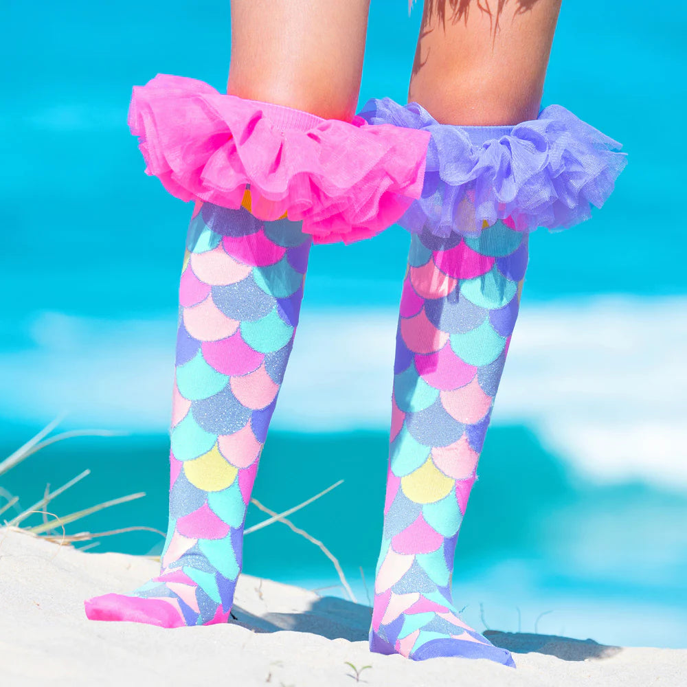 Don't pass up the chance to get our adorable mermaid-themed socks with extra fluffy frills and glitter! Enjoy these unique, vivid socks that were created just for you! Put them on, move your toes, and prepare to shimmer like a mermaid right away.