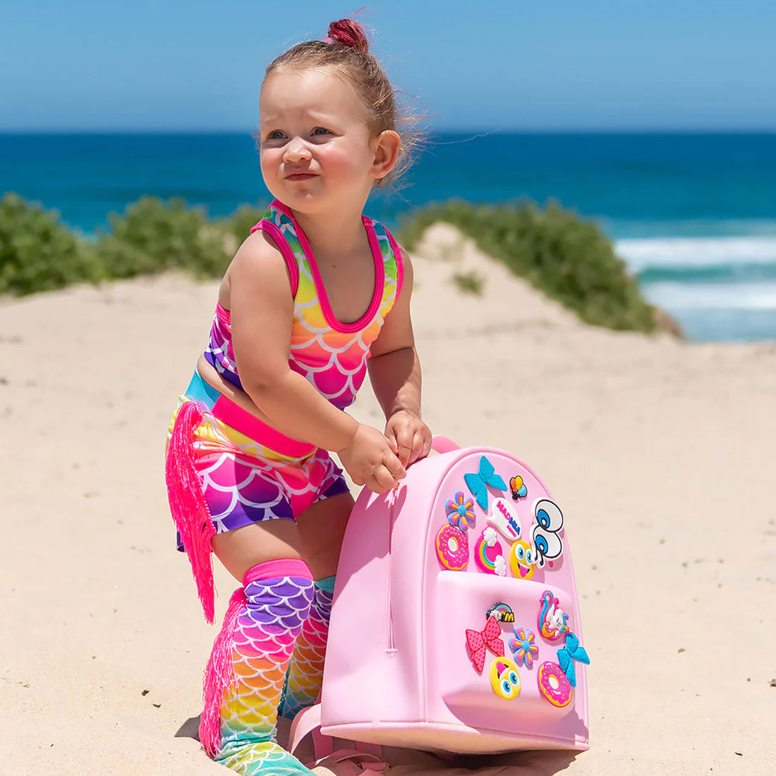 In my MADMIA Mermaid Socks, I'll just be a mermaid for the day even though I'm going to change the world.  Embrace your inner mermaid with these mix-and-match MADMIA Mermaid Socks in blue and pink with a matching scale design. With tassels that will cause you to dance and move like a mermaid.