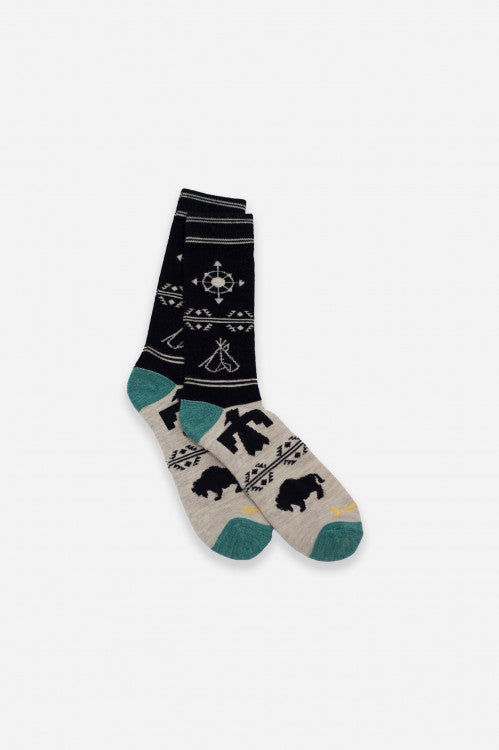 These compass crew socks from Pendleton will help you get where you're going in style. These Merino wool blend socks have a contrast seamed toe and heel and bold camping imagery.