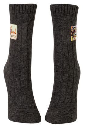 Anti-social butterfly Made with organically grown cotton, plus spandex for stretch, Tag socks look quite refined. But lean in closer and their finely stitched tags crack wise with the best of 'em. These socks are woven thick for that perfect mix of attractive texture and everyday comfy cushion. So cushiony, in fact, you can't even feel the tag.