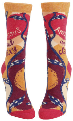 "Ready to strut your style and tackle anxiety? The Anxious and Sexy socks got you covered. Perfect for the confident fashionista on-the-go!
