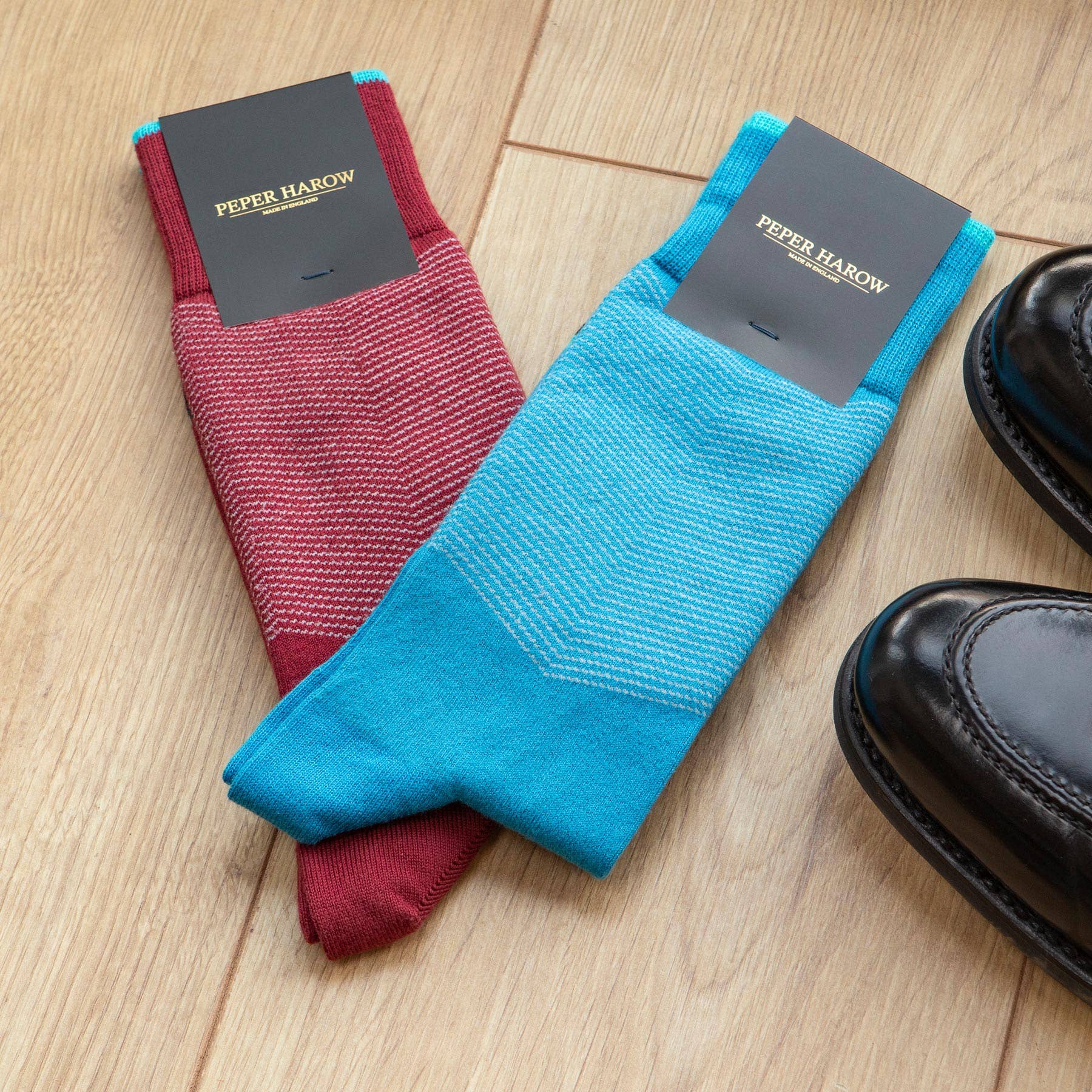 luxurious Chevron men's socks in stunning garnet red with a white V-line stripe