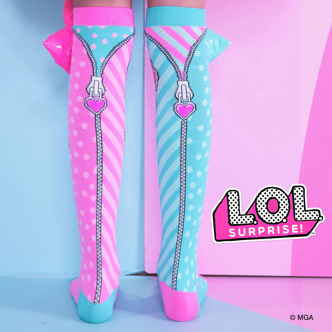 Wear a pair of our adorable L.O.L SURPRISE & MADMIA BONBON & DAWN Socks to become a better version of yourself! With these eye-catching socks that have a pink and blue MADMIA bow at the top, you'll stand out from the crowd!