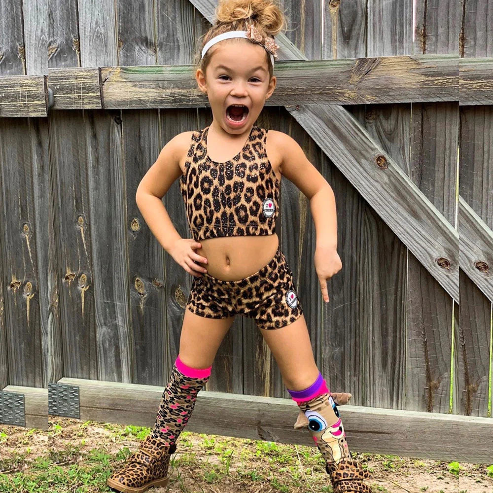 With our Cheeky Cheetah Socks in leopard print, embrace your wild side. They'll instantly make any outfit stand out thanks to their textured leopard style and real Cheetah with velvet ears and a pom pom tail. Roar!