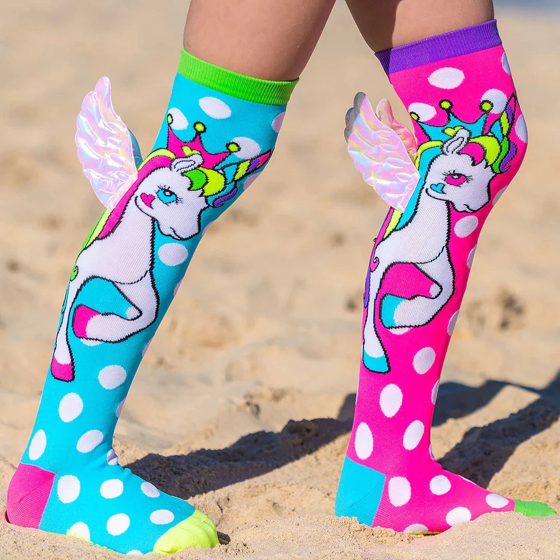 Can we simply live like unicorns all day long? Sure, we can! Have our MADMIA Flying Unicorn socks on.   MADMIA Flying Unicorn socks come in a variety of colors, including blue and pink, and include polka dots and a unicorn print. Including wings so you may dance while feeling like you're flying! 