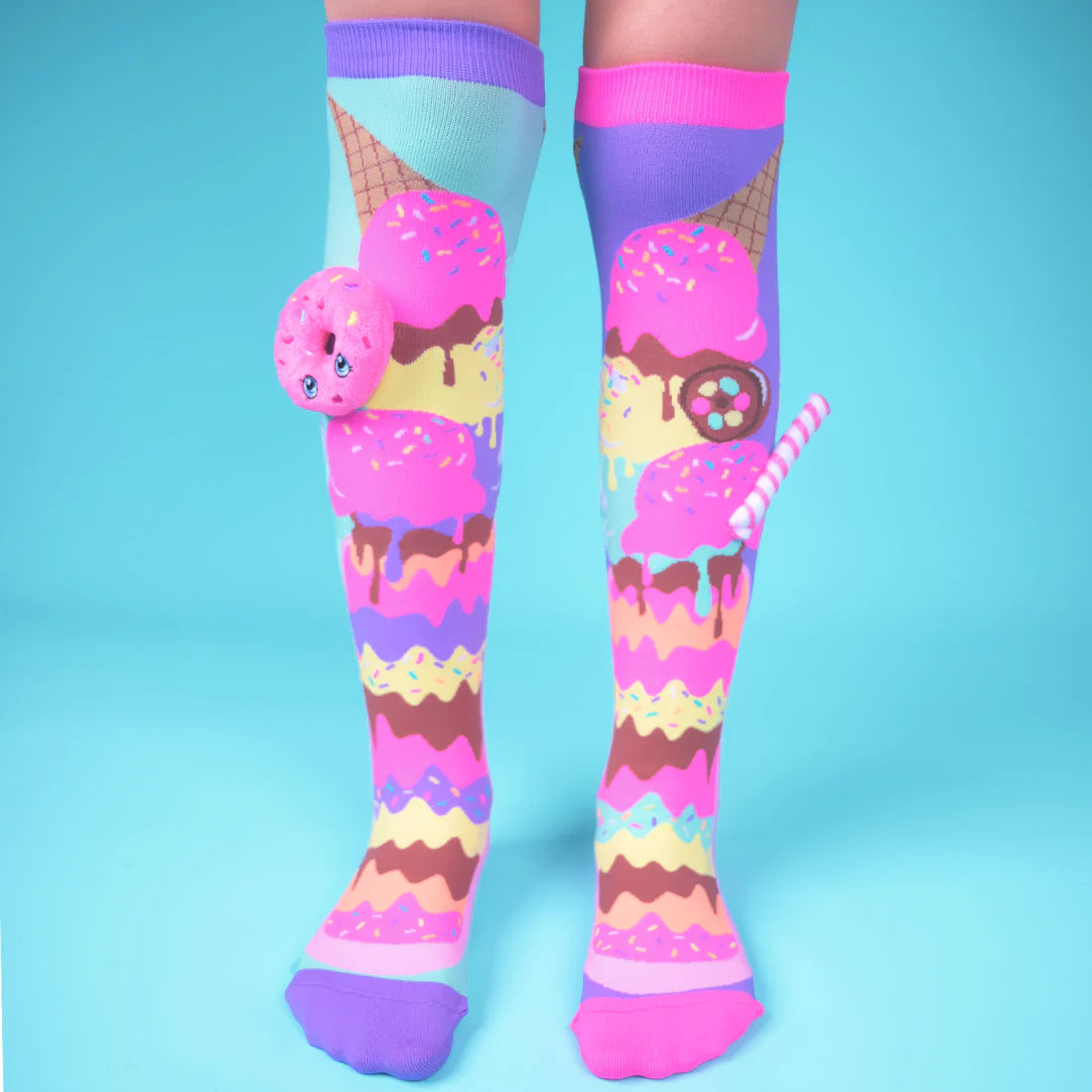 To add a bit of sweetness and excitement to your wardrobe, try our Milkshake Socks. These humorous socks are certainly one-of-a-kind due to their distinctive design, which includes a silly straw and a fluffy doughnut attached. These socks are soft, comfy, and long lasting because they are made of high-quality materials.