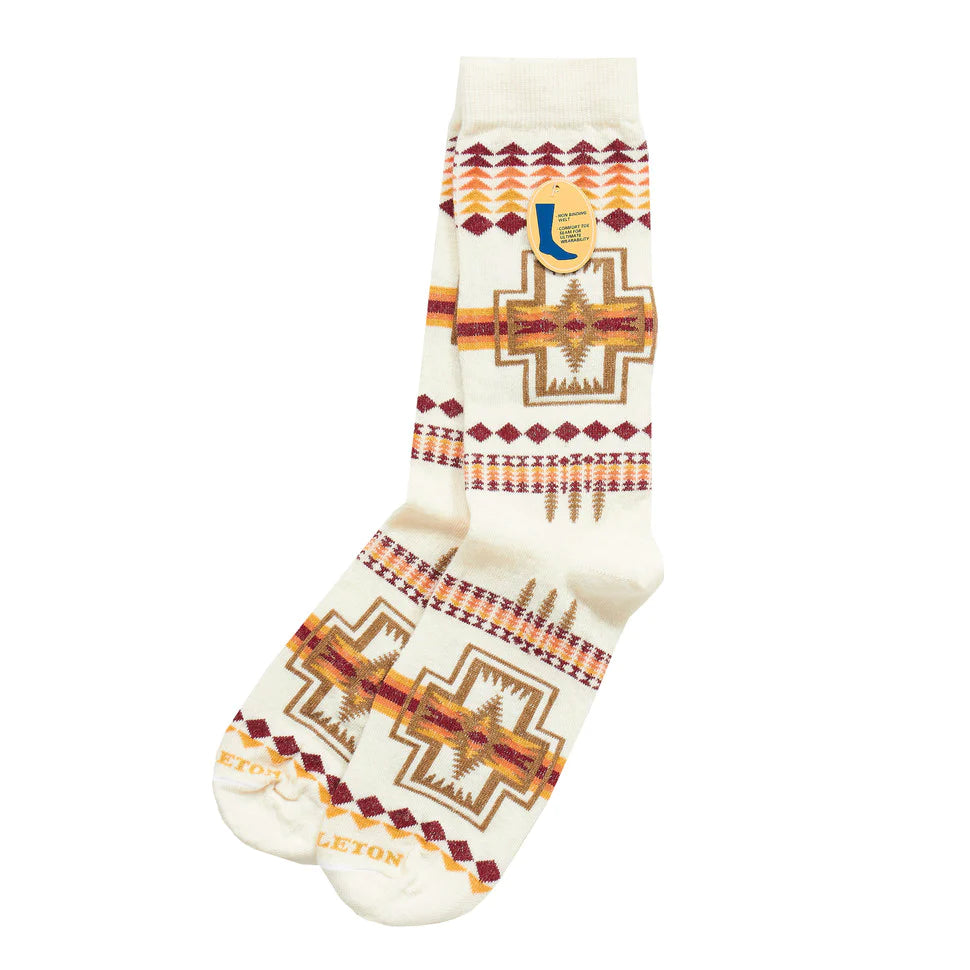 Now available in sturdy midweight crew socks, this is one of our most well-liked patterns.   This durable design, which is machine washable, is knit from plush Merino wool and has cushioned footbeds for all-day comfort. Men and women both love their cosy warmth and breathability.