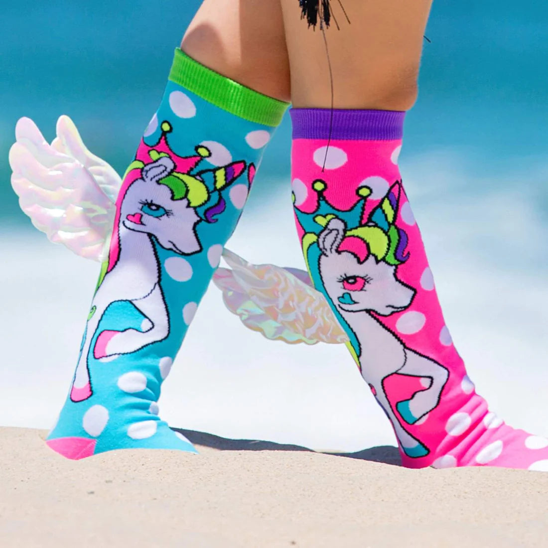 Can we simply live like unicorns all day long? Sure, we can! Have our MADMIA Flying Unicorn socks on.   MADMIA Flying Unicorn socks come in a variety of colors, including blue and pink, and include polka dots and a unicorn print. Including wings so you may dance while feeling like you're flying! 